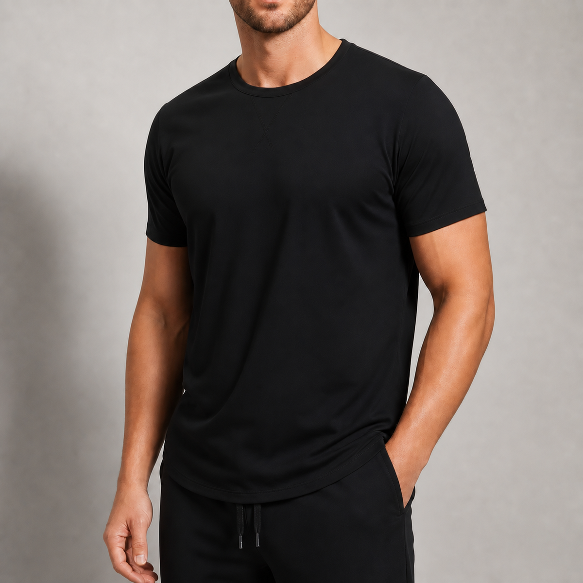 Close view of the tonal neckline stitch sleeve shape and relaxed torso of the black Averon Classic Fit
