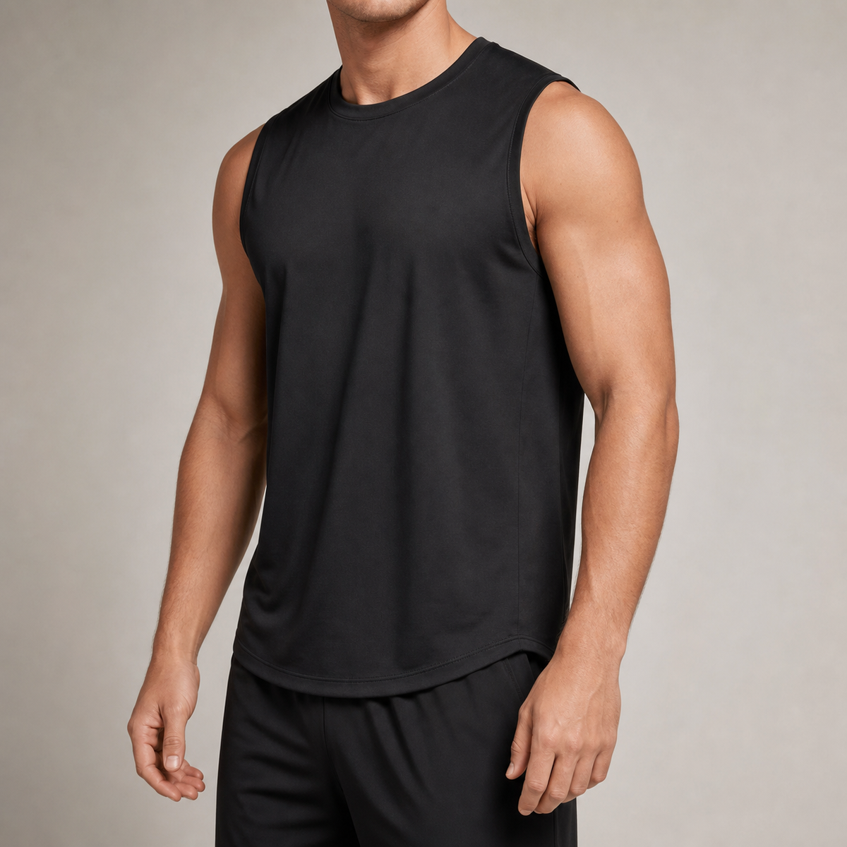Close view of the neckline armholes and curved hem of the black Averon FitFlex Sleeveless